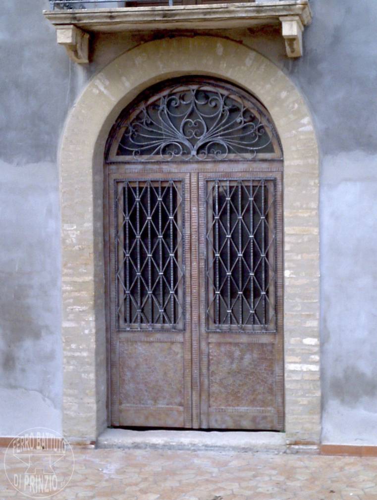 Porta vetro e ferro battuto