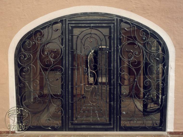 Porta in ferro battuto e vetro